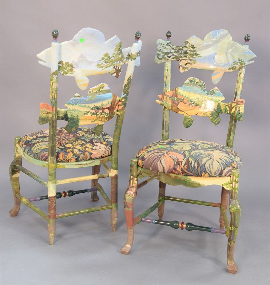 Appraisal: Two Mackenzie Childs Forest Fish chairs hand painted maple frame