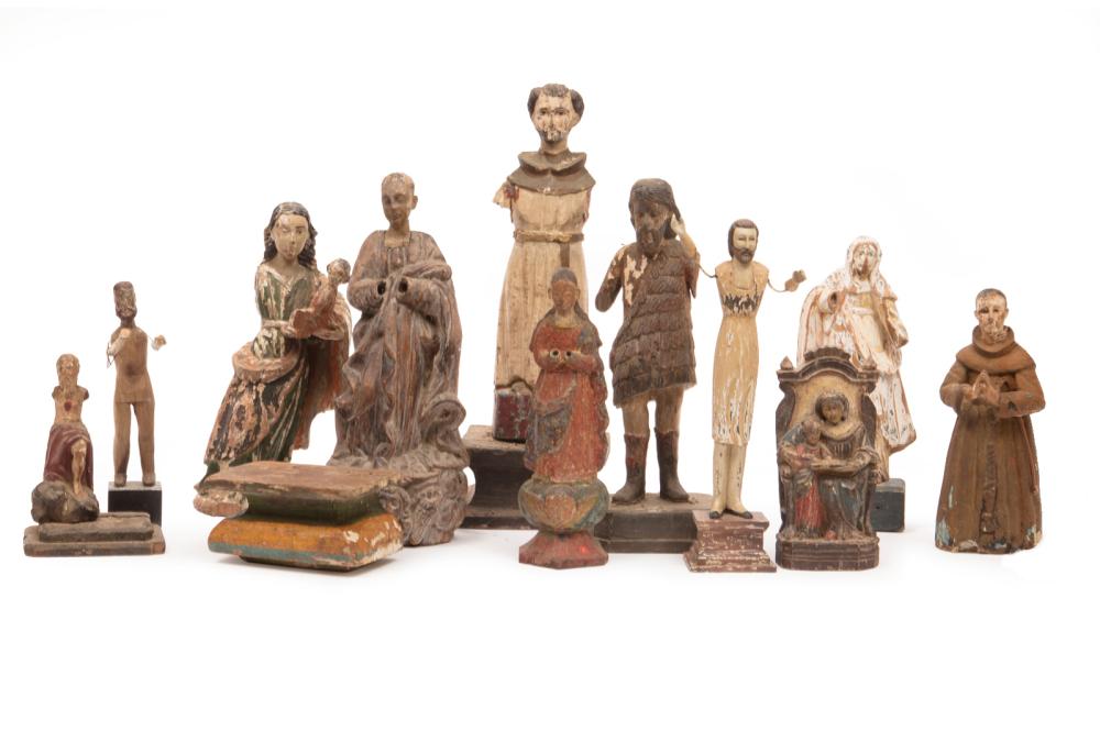 Appraisal: Eleven Antique Carved and Painted Wood Santos Figures tallest h