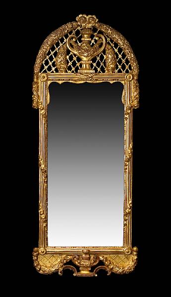 Appraisal: A Norwegian Neoclassical giltwood mirror last quarter th century The