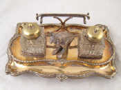 Appraisal: Australian interest A silver plated two bottle inkstand with square