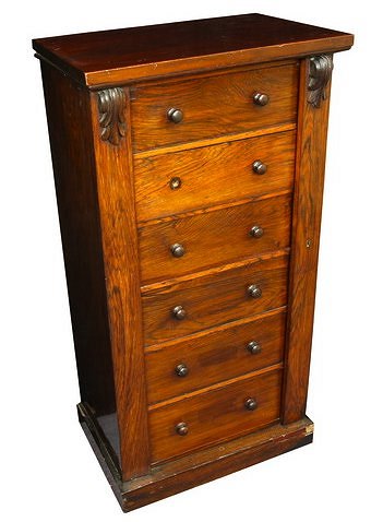 Appraisal: A Regency rosewood Wellington chest with hinged locking pillar to