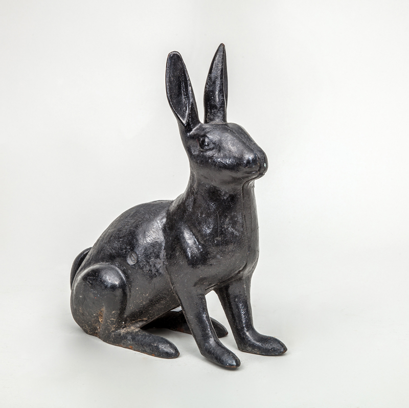 Appraisal: CAST-IRON BLACK PAINTED RABBIT-FORM DOOR STOP x x in Ambassador