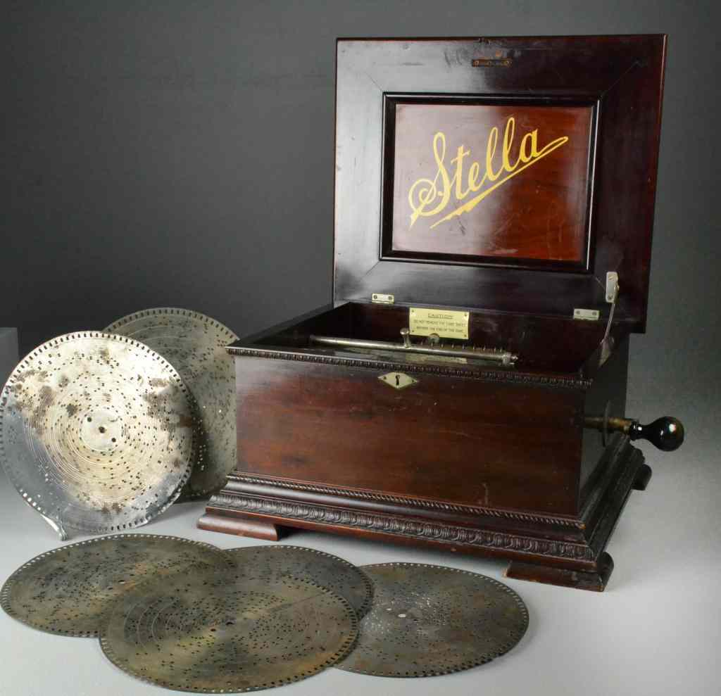 Appraisal: Stella Brivete th Century Disc-playing Music BoxMahogany-cased metal-disc playing crank