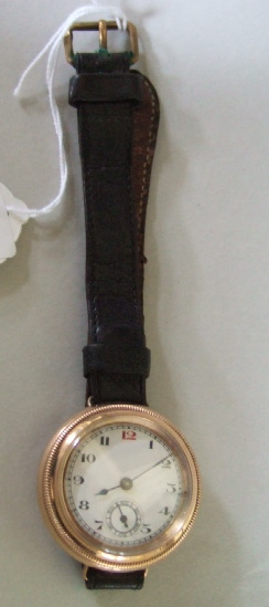 Appraisal: A ct gold circular cased double cased wristwatch the enameled