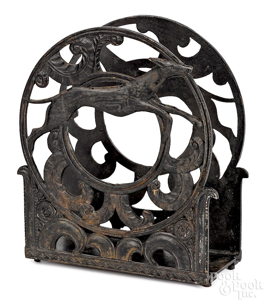 Appraisal: Art Deco cast iron magazine rack Exclusive on Bidsquare Art