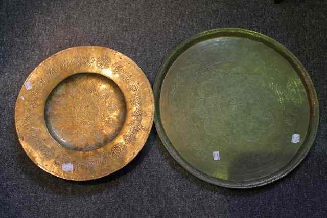 Appraisal: A PERSIAN BRASS TWO HANDLED LARGE BOWL a Persian brass