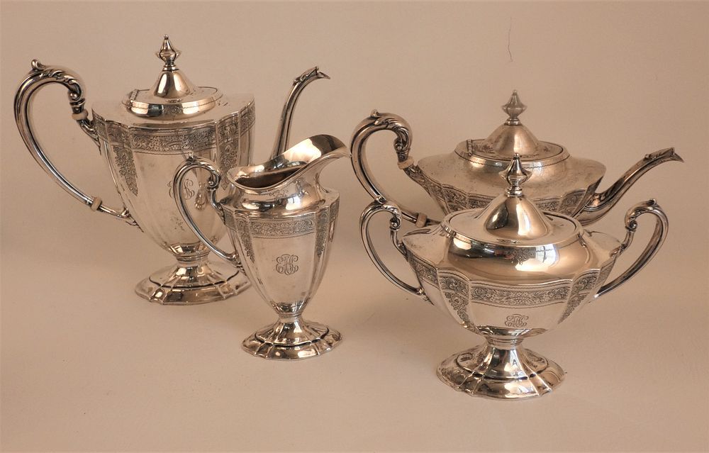 Appraisal: STERLING SILVER PIECE TEA SET Old sterling silver floral engraved