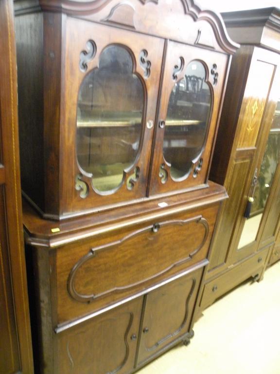 Appraisal: A thC German secretaire cabinet the top with two glazed