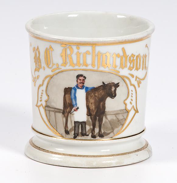 Appraisal: BUTCHER OCCUPATIONAL SHAVING MUG Porcelain mug with gilding and painting