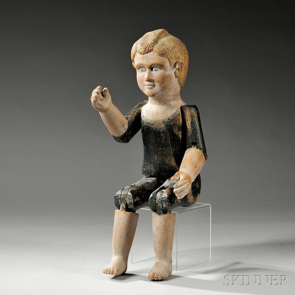 Appraisal: Carved and Painted Articulated Figure of a Boy possibly New