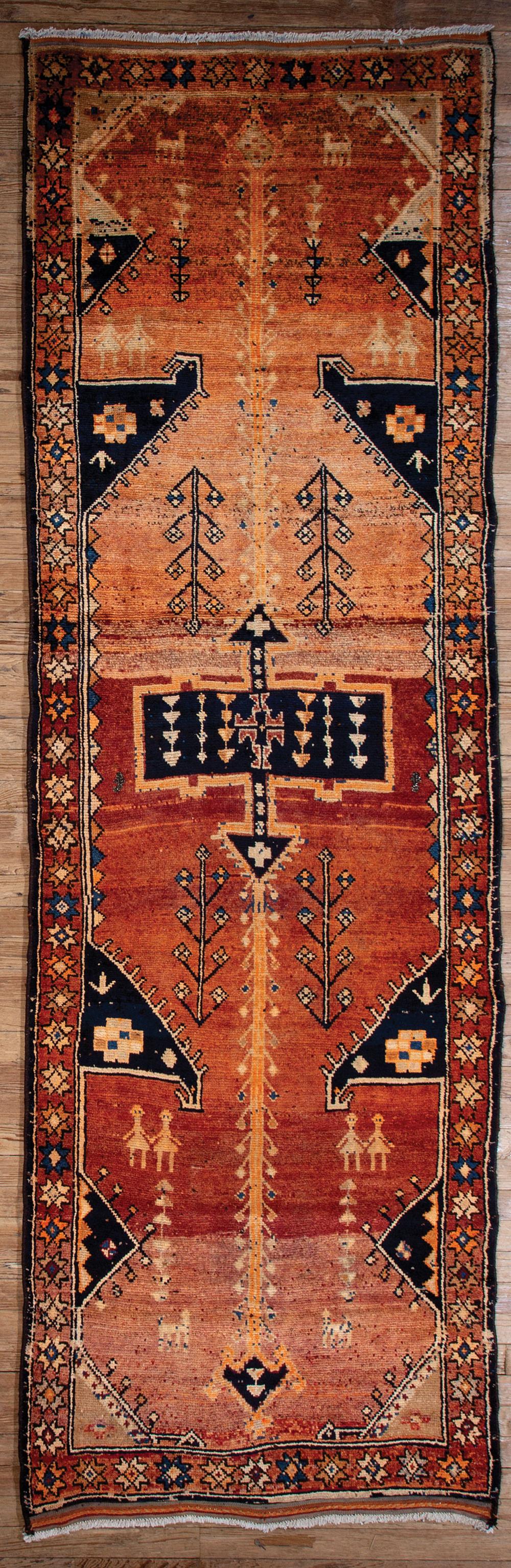 Appraisal: Persian Qashqai Carpet red-orange ground geometric stylized floral and figural