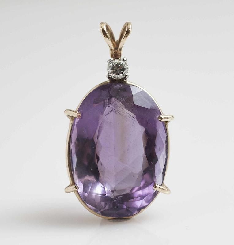 Appraisal: Amethyst Diamond k Pendant Amethyst and diamond pendant in a