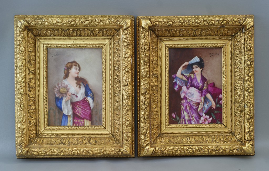 Appraisal: Unmarked Continental porcelain plaques Young Woman Holding Feather Fan Young