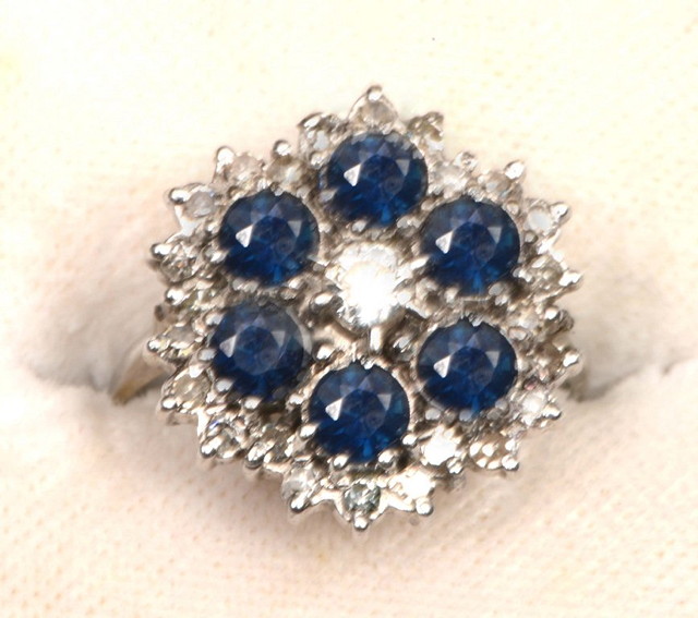 Appraisal: A LADIES RING with diamond and sapphire cluster setting