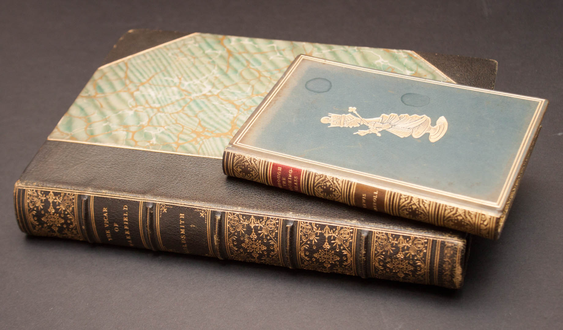 Appraisal: Bindings Two classic titles in full leather Lewis Carroll Through