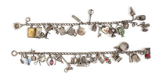 Appraisal: Sale Lot A Pair of Vintage Sterling Silver Charm Bracelet