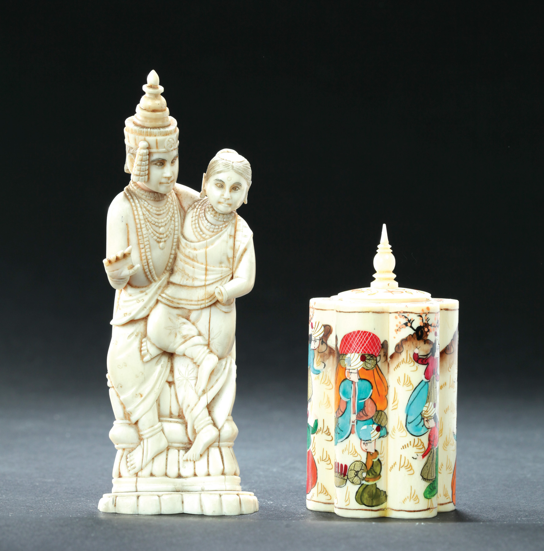 Appraisal: TWO IVORY CARVINGS India th- th century Painted box and