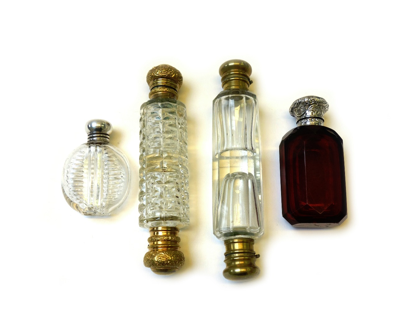 Appraisal: A Victorian double ended clear glass scent bottle of faceted