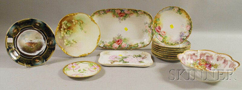 Appraisal: Set of Eight Gilt and Hand-painted Rose-decorated Limoges Porcelain Plates