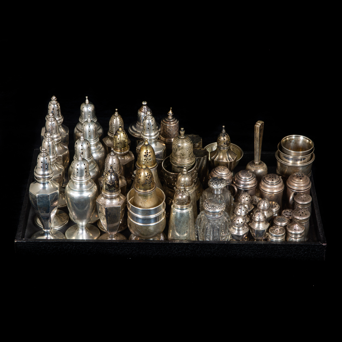 Appraisal: LARGE GROUPING OF STERLING SHAKERS Large grouping of sterling shakers