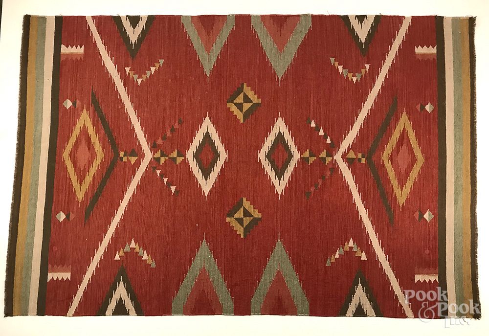 Appraisal: Two Native American style rugs Two Native American style rugs