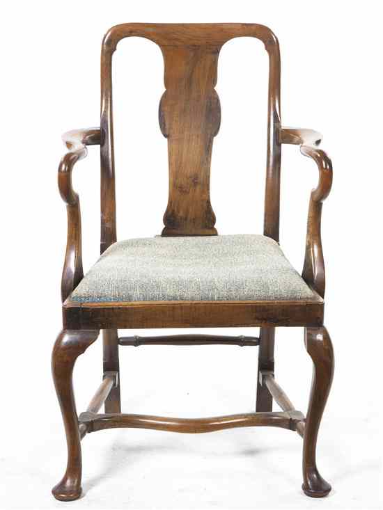 Appraisal: A Queen Anne Style Open Armchair having a vasiform vertical