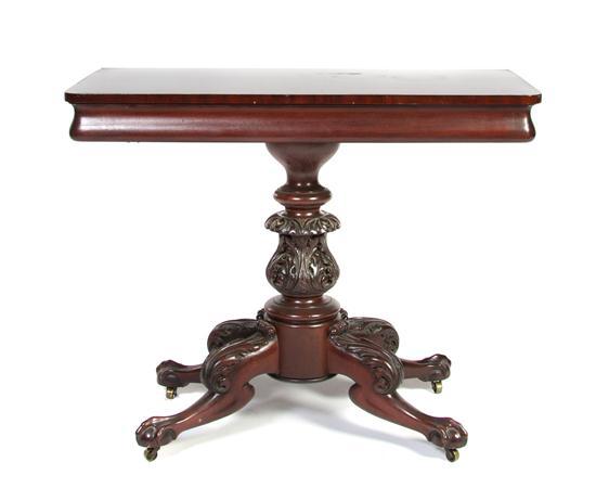 Appraisal: Chippendale Style Games Table the rectangular lift-top having rounded corners