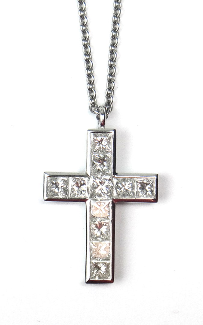 Appraisal: An Asprey Garrard platinum and diamond set pendant cross mounted