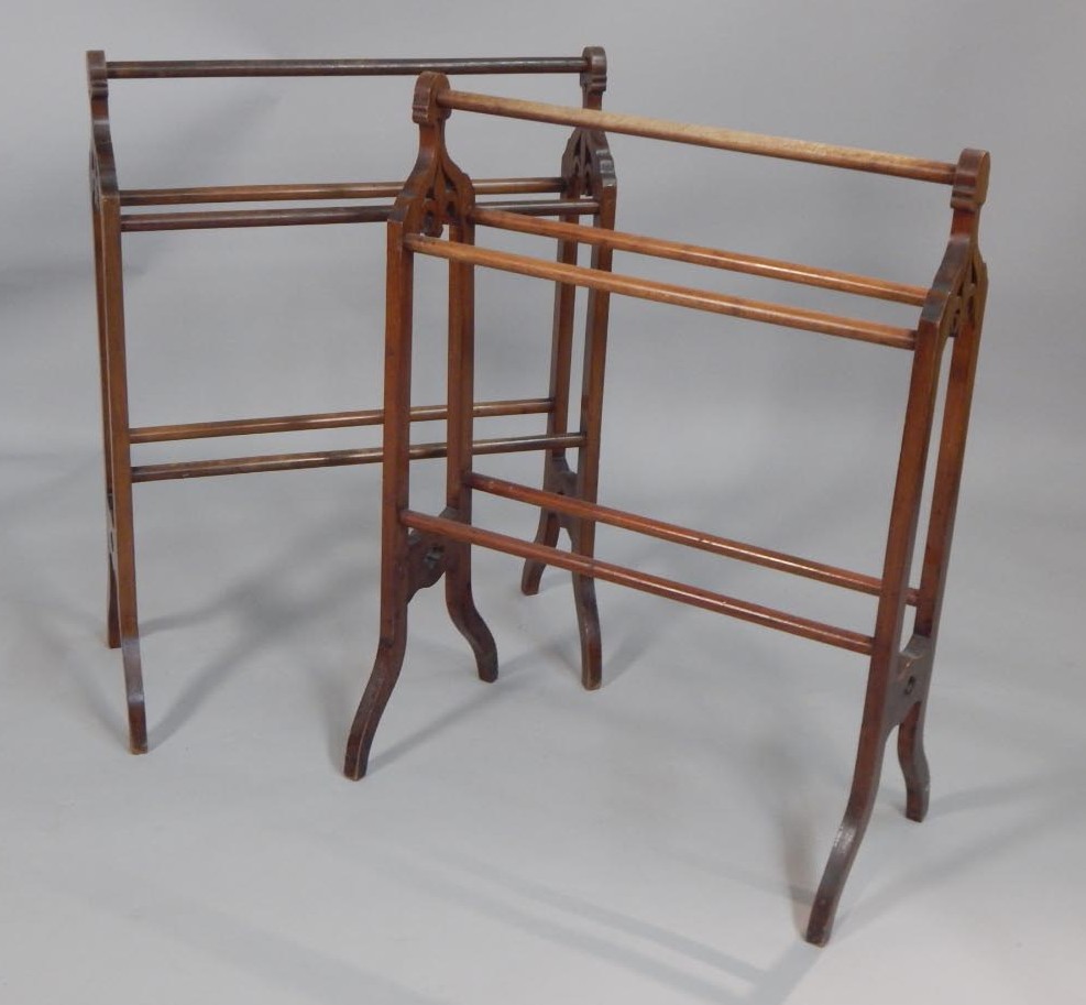 Appraisal: A pair of Victorian Gothic style mahogany towel rails