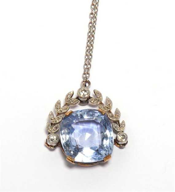 Appraisal: SAPPHIRE AND DIAMOND PENDANT WITH CHAIN ca Yellow gold and