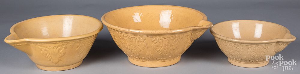 Appraisal: Nest of three yellowware batter bowls th c Nest of