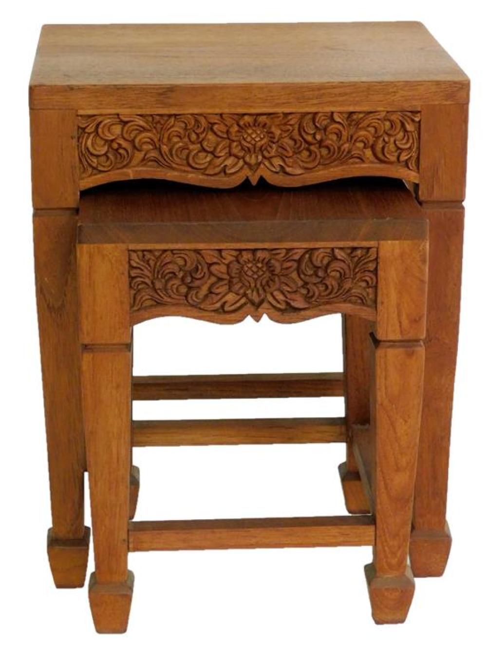 Appraisal: ASIAN Pair of Indonesian nesting tables heavily carved skirts with