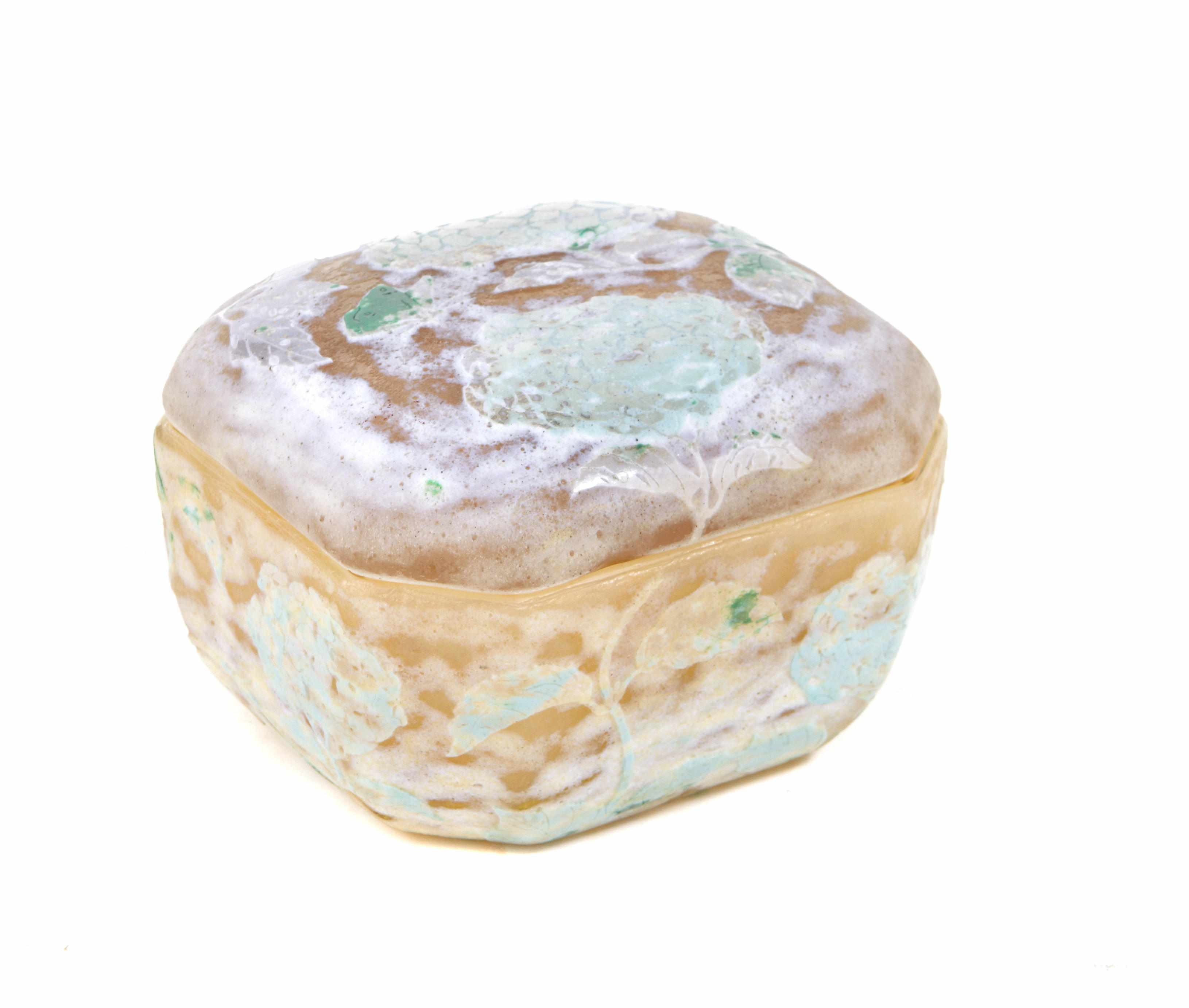 Appraisal: A Daum Nancy vitrified cameo glass covered box circa underside