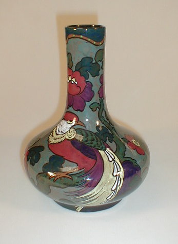 Appraisal: A Decoro pottery bottle vase painted with pheasant and flowers