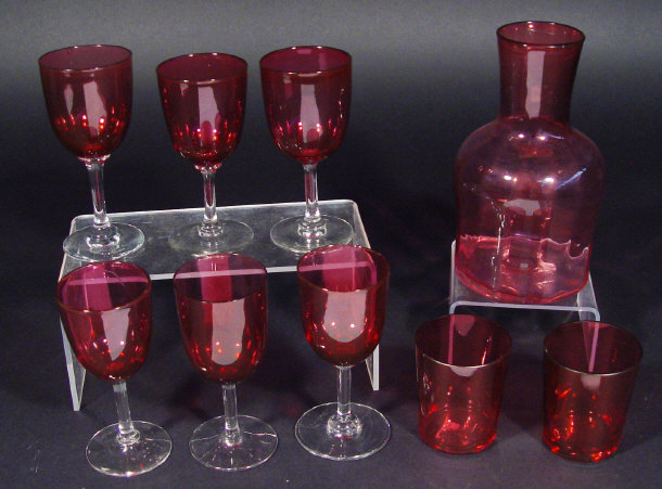 Appraisal: Cranberry glass carafe two beakers and six wine glasses the