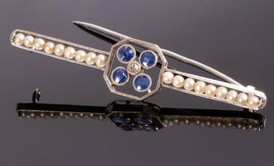 Appraisal: An Art Deco sapphire and diamond bar brooch the central