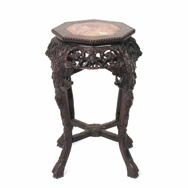 Appraisal: A Chinese carved hardwood side table inset with a marble