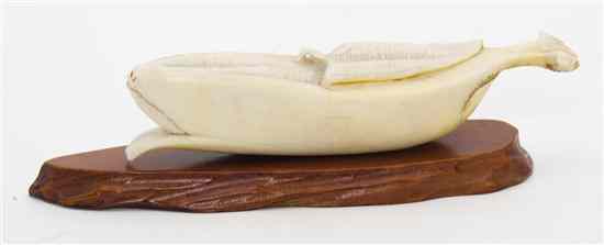 Appraisal: A Japanese Carved Bone Article depicting a plantain on a