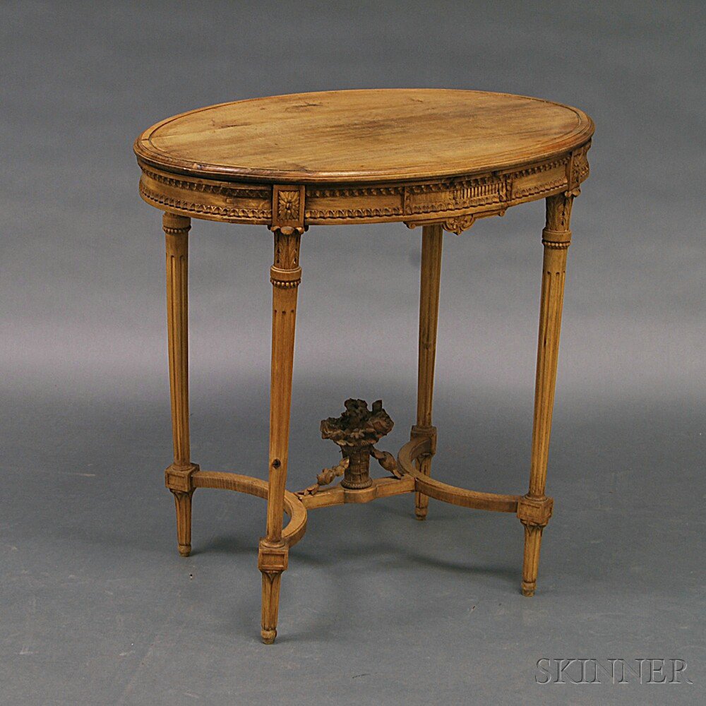 Appraisal: Louis XVI-style Carved Oak Side Table the oval top and