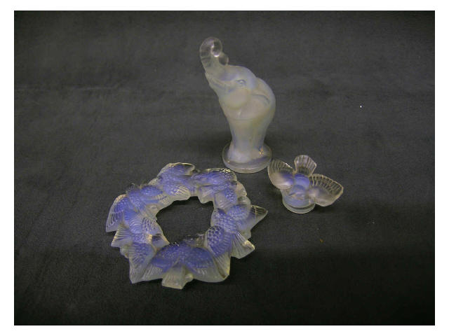 Appraisal: Signed Sabino elephant bird wreath ornament and miniature bird on