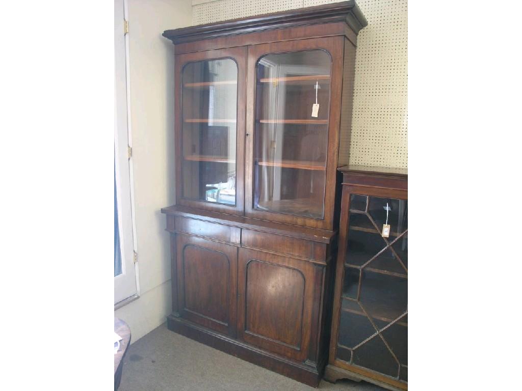 Appraisal: An early Victorian mahogany tall bookcase three adjustable shelves enclosed