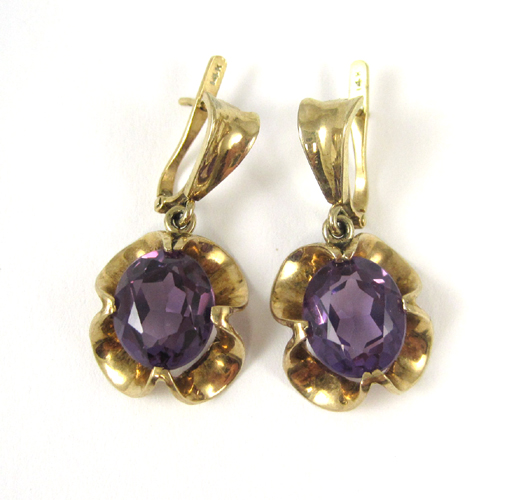 Appraisal: PAIR OF SYNTHETIC COLOR CHANGE SAPPHIRE EARRINGS each k yellow