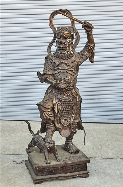 Appraisal: Chinese bronze figure of a general wielding a baton with