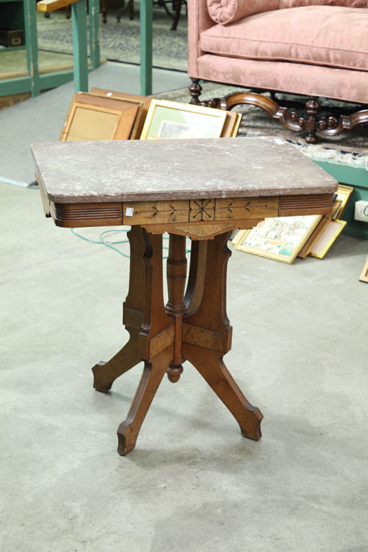 Appraisal: VICTORIAN MARBLE TOP TABLE Brown mottled marble having rounded corners