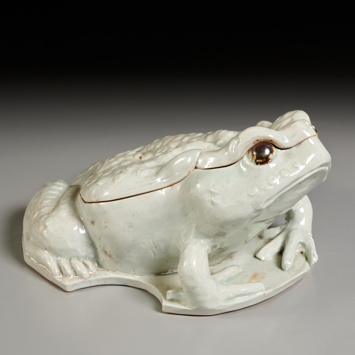 Appraisal: ASIAN PALE CELADON TOAD-FORM LIDDED CONTAINER th th c possibly