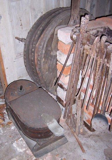 Appraisal: A blacksmith's bellows and a foot operated bellows