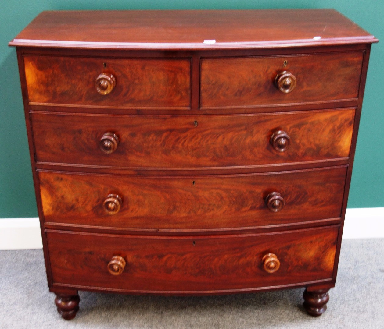 Appraisal: An early th century mahogany bowfront chest of two short