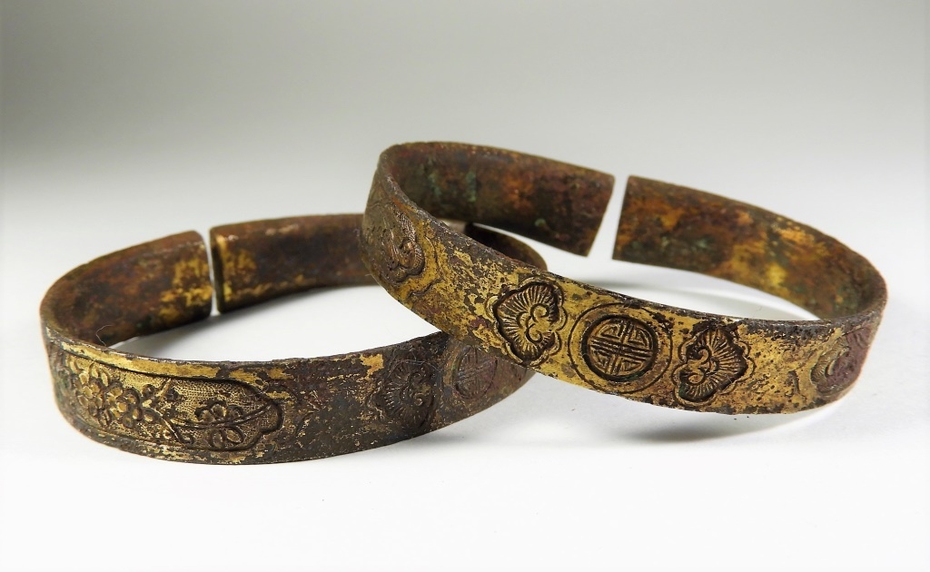 Appraisal: PR CHINESE ARCHAIC PRIMITIVE GILT BRONZE BRACELETS China Qing DynastyEach