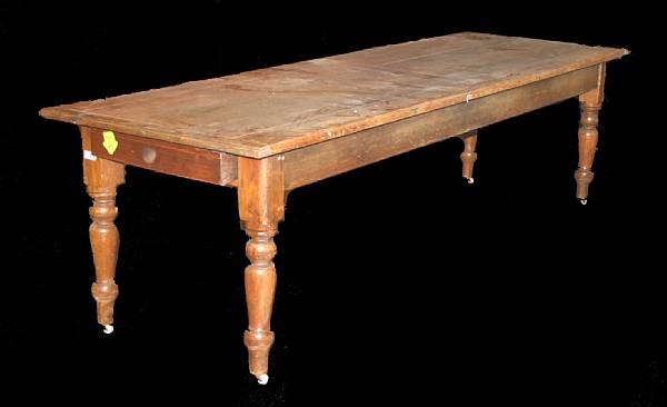 Appraisal: A stripped pine farm table th century height in width