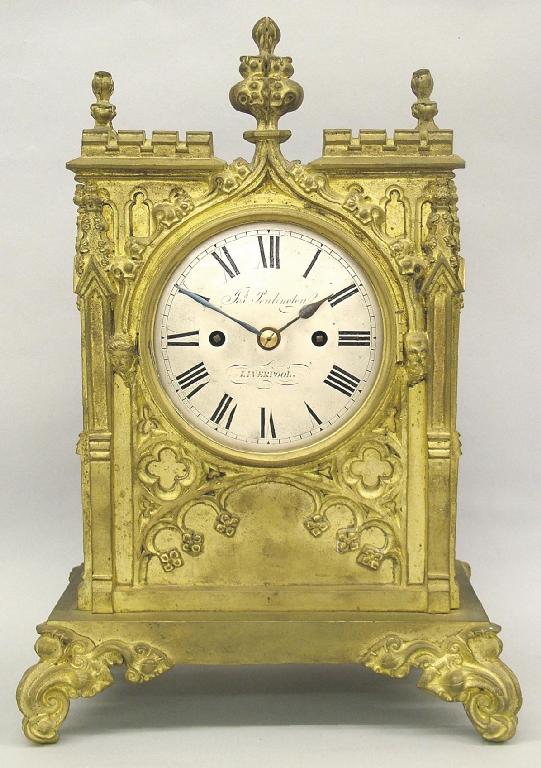 Appraisal: English gilt-brass double fusee Gothic mantel clock the silvered dial